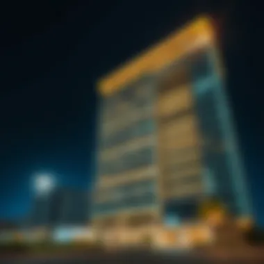 Nighttime illumination of the Al Serkal Building emphasizing its architectural brilliance
