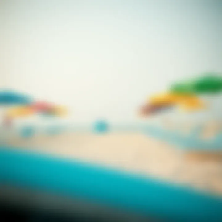 Colorful beach umbrellas and lounge chairs lined along the pristine sand