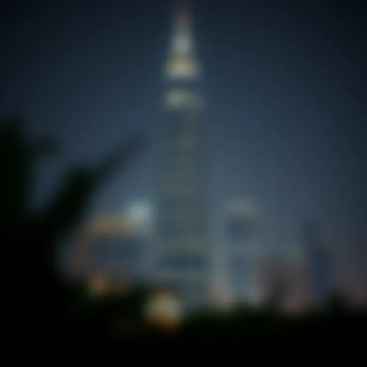 Night view of Capitol Tower illuminated in the Dubai skyline