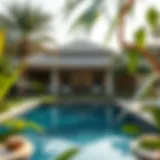 Luxurious villa with a private pool surrounded by lush greenery