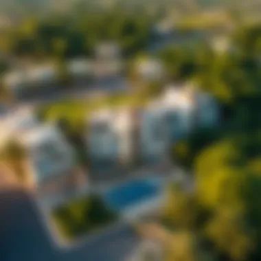Aerial view of Tilal Ghaf showcasing its lush greenery and luxurious villas